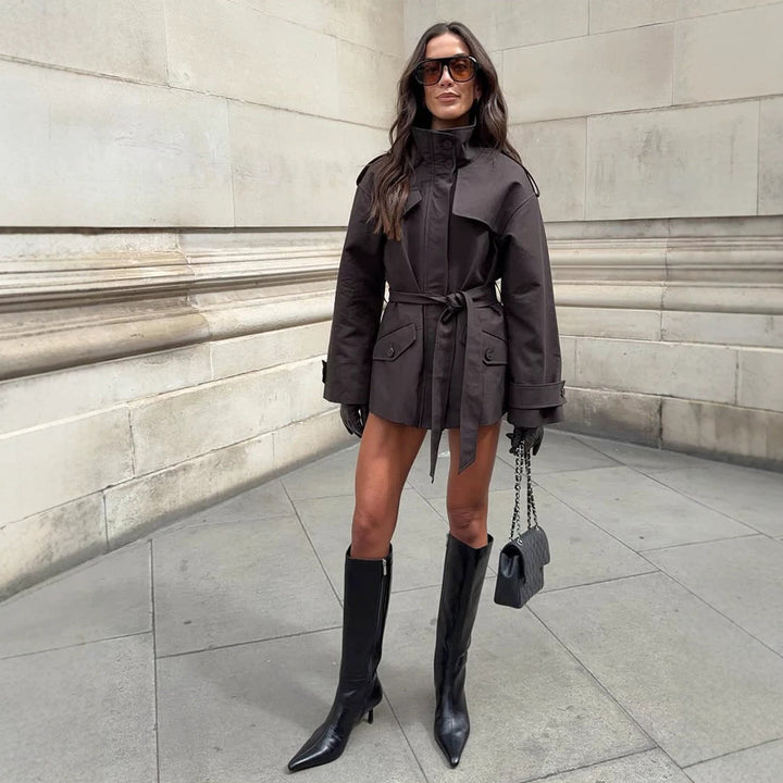 Women's Short Tailored Trench Jacket with Stand-Up Collar, Flap Pockets and Tie Belt Mune Fashion