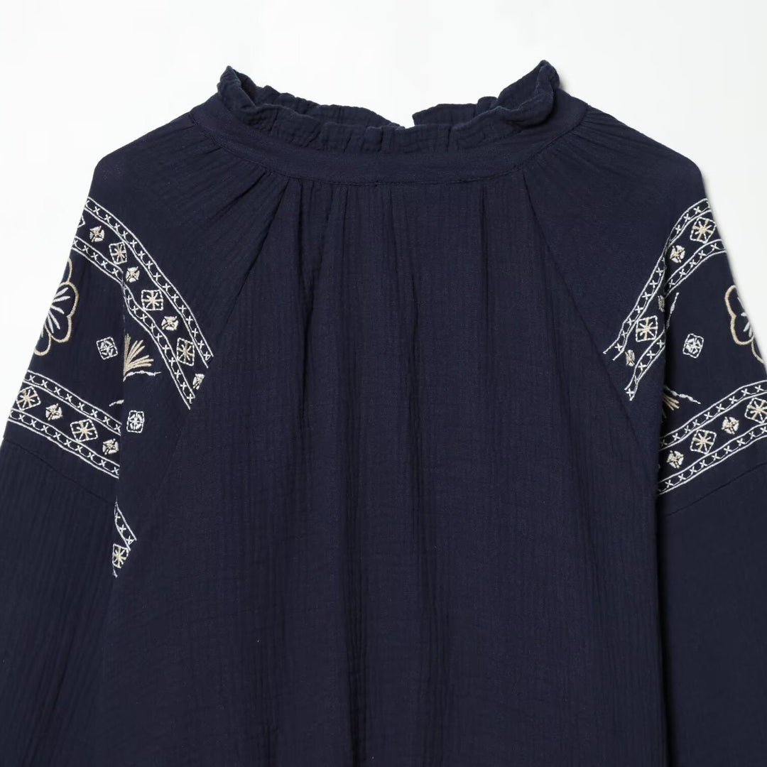 Women nan embroidered Boho blouse with gathered stand collar, balloon sleeves, and short hem Mune Fashion