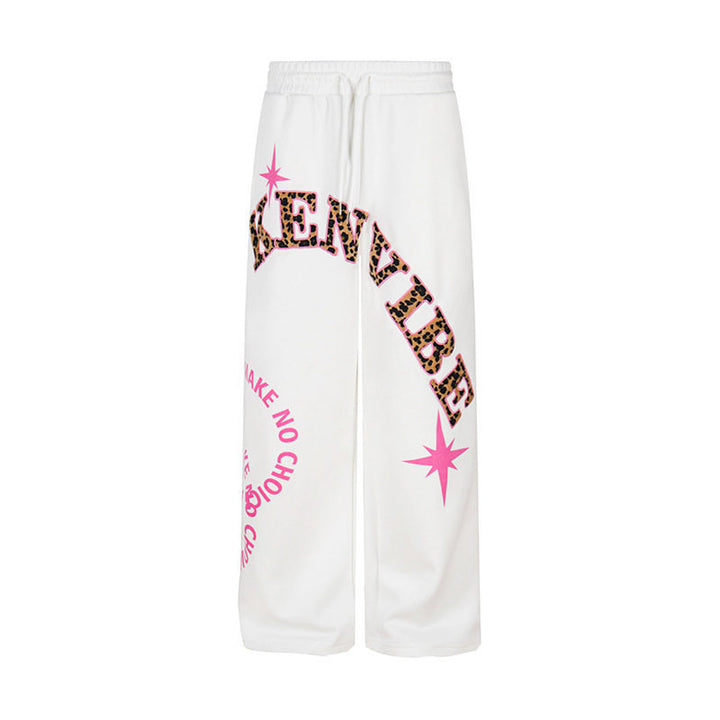 Women's wide jogging pants in culotte style with drawstring and statement print Mune Fashion