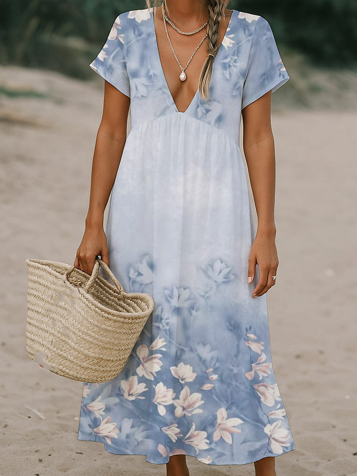Ladies max dress with deep V-neck and flowing skirt Mune Fashion
