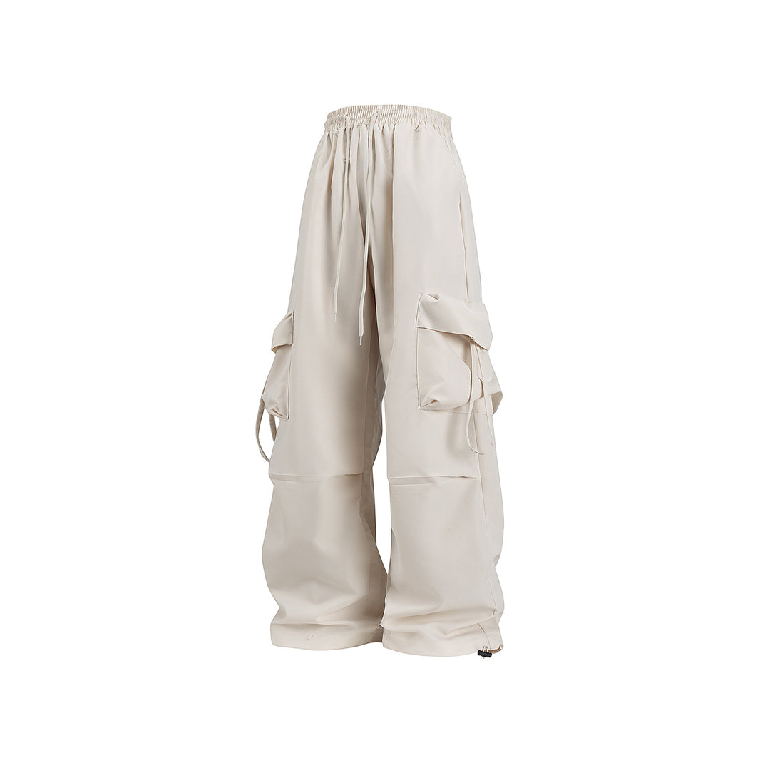 Unisex Wide Cargo Pants in Baggy Cut with Drawstring Waistband, Multiple Flaps, and Adjustable Leg Closures Drune