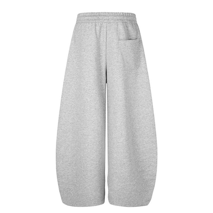 Women's Wide Midi Lounge Sweatpants in Palazzo Cut with Drawstring, Zip Hem and Statement Print Mune Fashion