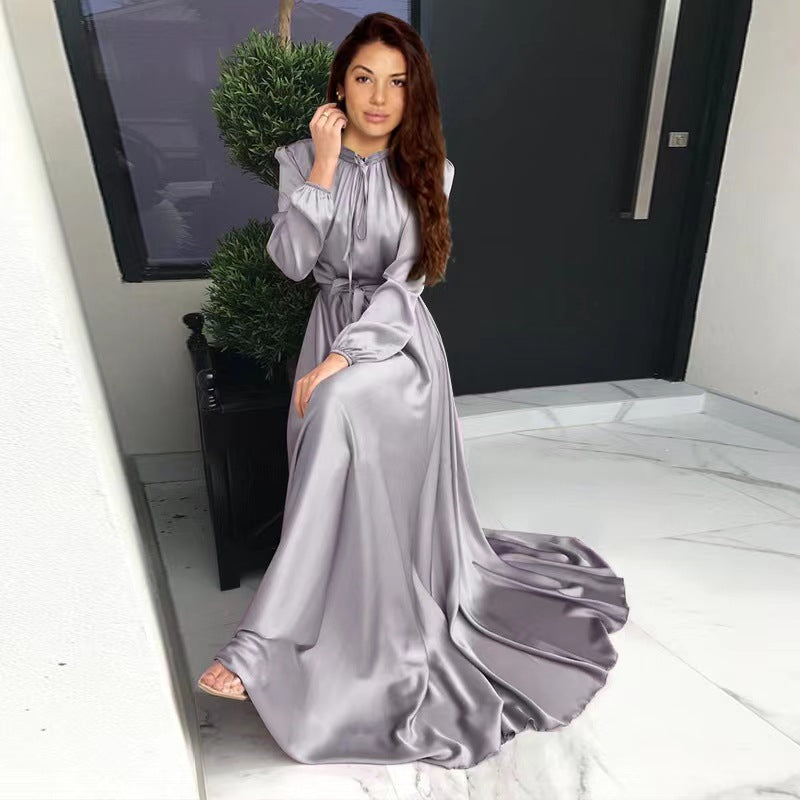 Women's maxi dress made of flowing satin with stand-up collar and tie belt Mune Fashion
