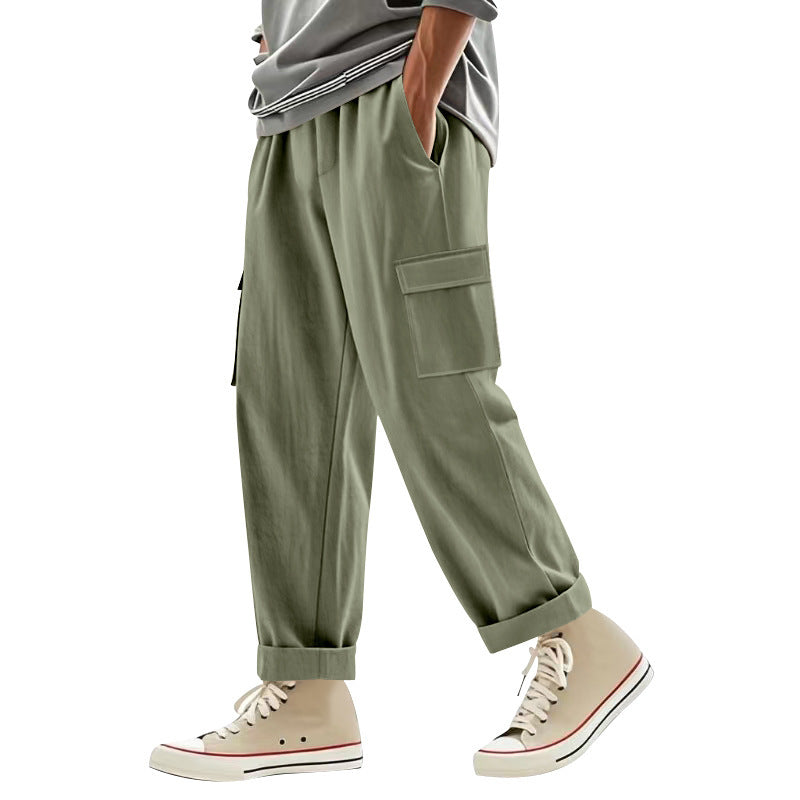 Men's wide cargo pants with flap pockets, elastic comfort waistband, and turned-up hem Mune Fashion