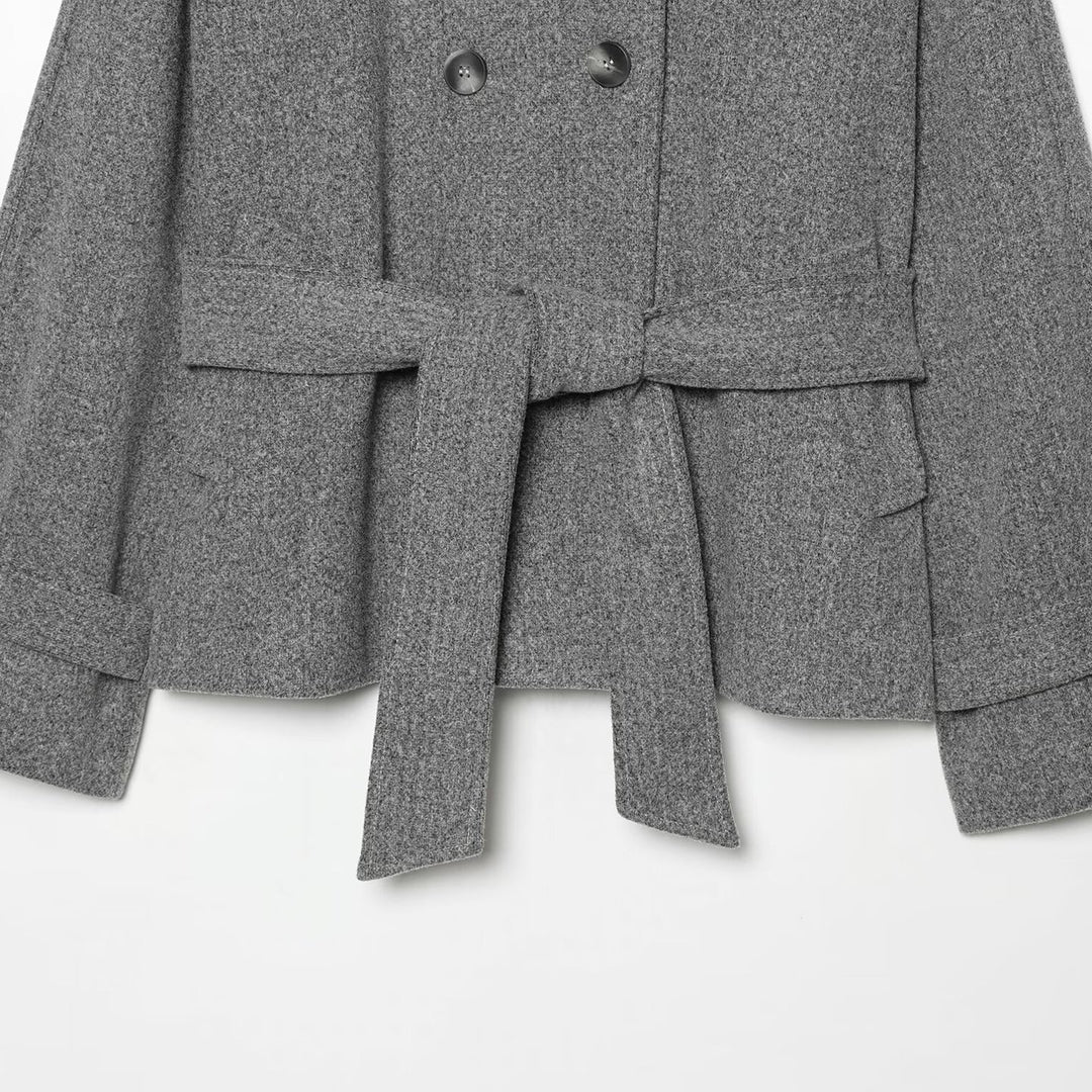Women's cape transitional jacket in a short cut with a high collar, double button placket, and waist tie belt Mune Fashion