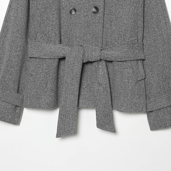 Women's cape transitional jacket in a short cut with a high collar, double button placket, and waist tie belt Mune Fashion
