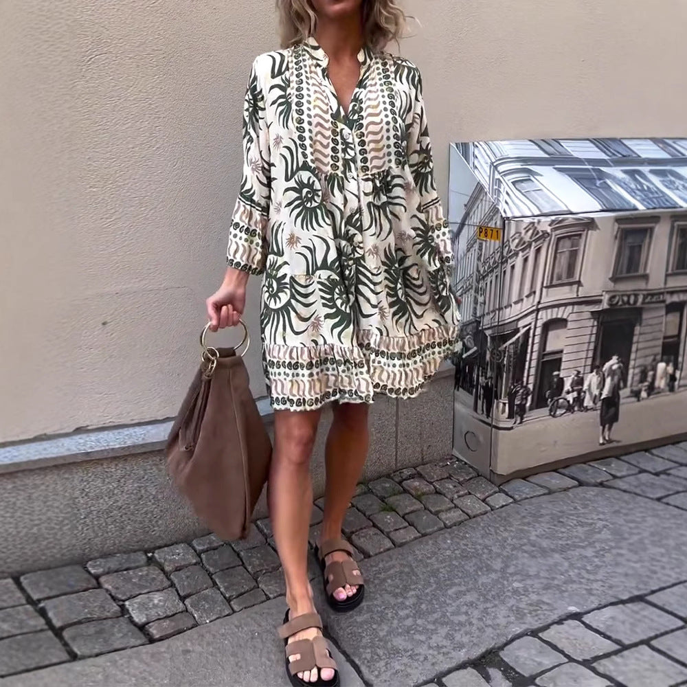 Women’s knee-length Boho tunic dress with V-neck, gathered empire seam, and ruffled hem Mune Fashion