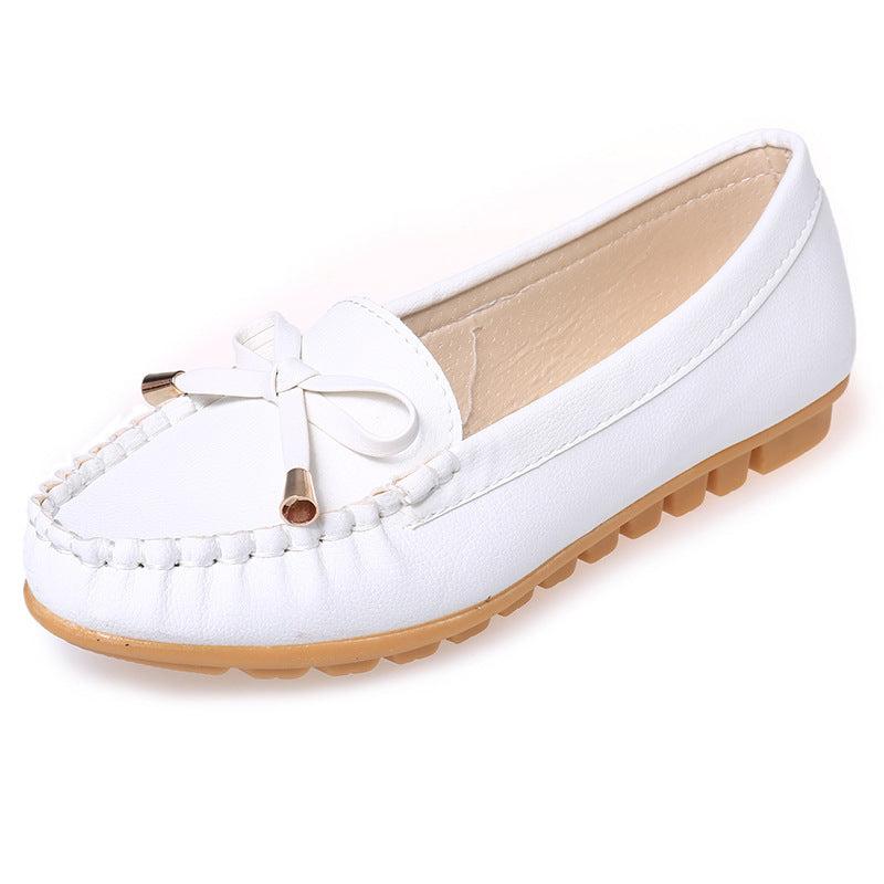 Women's Leather Look Moccasin Slipper with Decorative Bow and Profiled Rubber Sole Design Mune Fashion