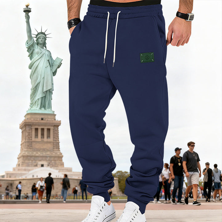 Men's Slim-Fit Sweat Jogger with elastic waistband, drawstring, and ribbed cuffs