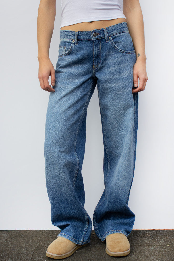 Women's wide denim pants model with deep waist and wide flare Mune Fashion