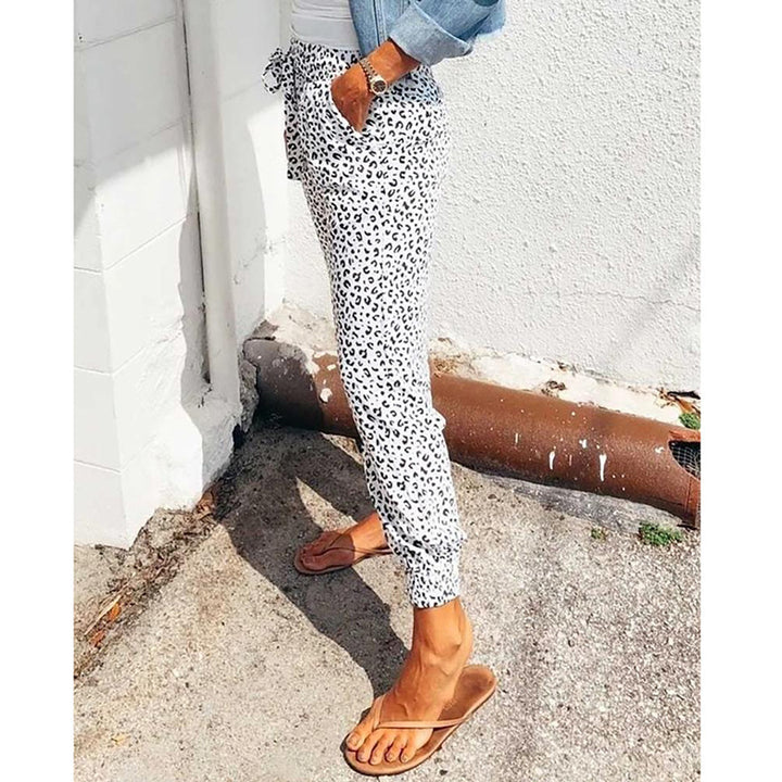 Ladies casual leopard print jogging pants with drawstring, side pockets, and elastic cuffs Mune Fashion
