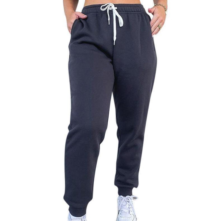 Women's tapered jogging pants at ankle height with elastic comfort waistband, adjustable drawstring, and deep side pockets Mune Fashion