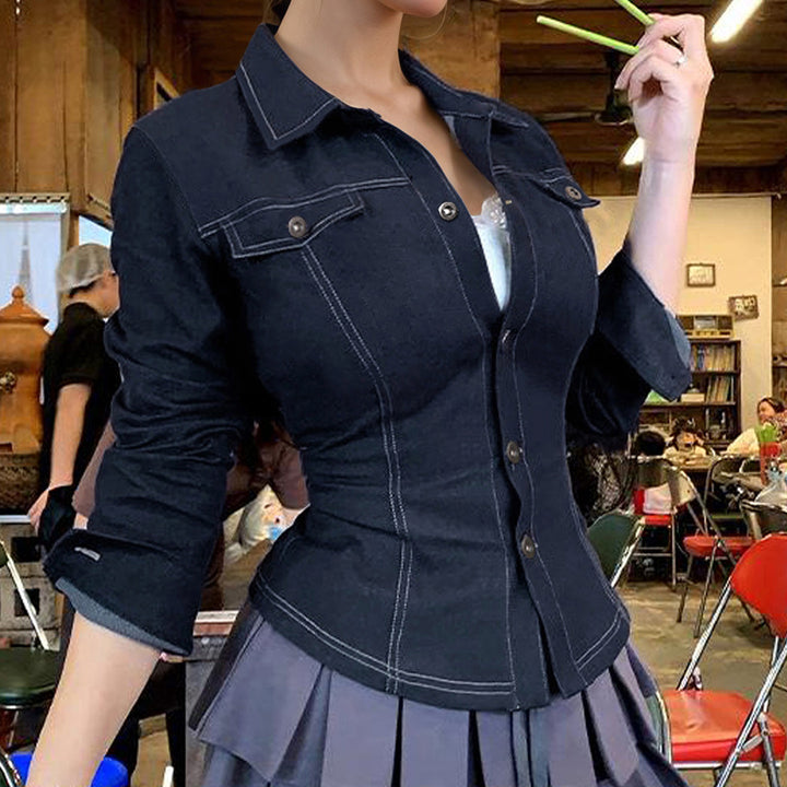 Women's fitted denim jacket with striking contrast seams, chest pockets, and figure-flattering cut Mune Fashion