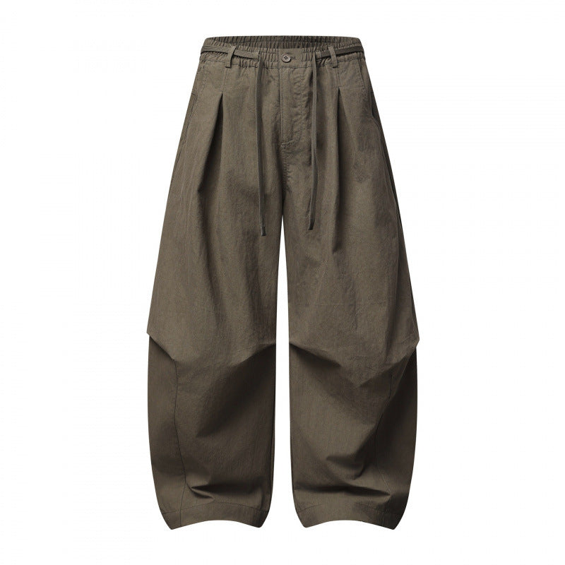 Unisex wide layered pants with balloon-shaped silhouette, high waist and drawstring Mune Fashion