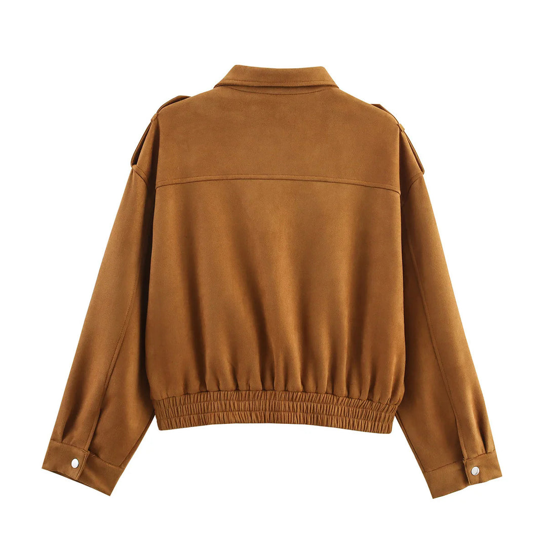 Women's cropped utility jacket with shoulder epaulettes, applied flap pockets, and elastic hem Mune Fashion