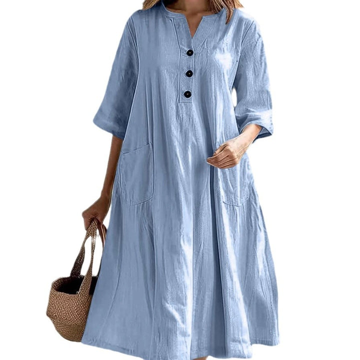 Women's casual falling A-line dress with V-neck button placket, 3/4 sleeves and patch pockets Mune Fashion