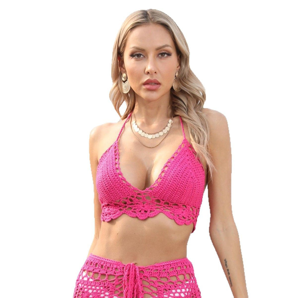 Women crocheted top with deep V-neckline and decorative accents Mune Fashion