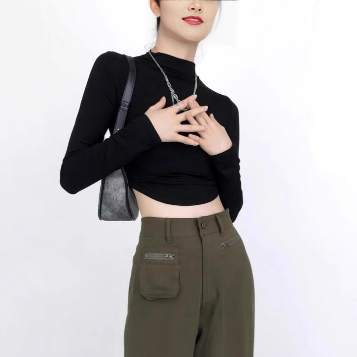 Ladies form-fitting long sleeve cropped top with stand-up collar, side gathering and extended sleeves Mune Fashion
