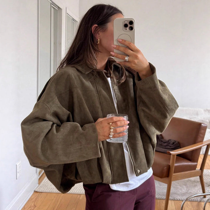 Women's loose short jacket with balloon hem, concealed closure and shoulder flaps Mune Fashion