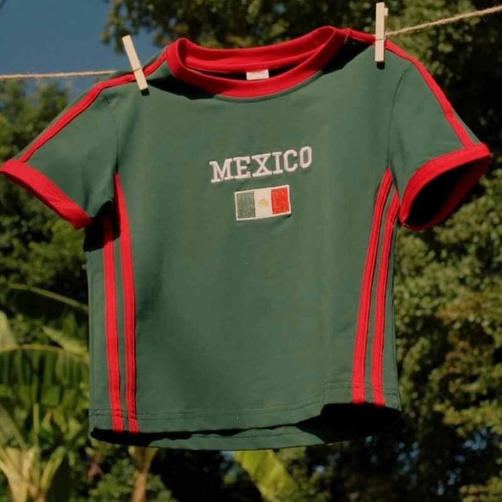 Unisex nan sporty retro short sleeve T-shirt with flag motif and fitted cut Mune Fashion