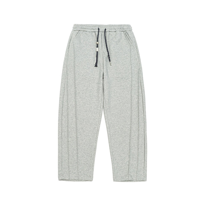 Women's Wide High-Waist Jogging Pants with Decorative Seams and Drawstring Mune Fashion