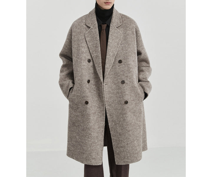 Men's oversized double-breasted wool coat with notched lapels and patch pockets Mune Fashion