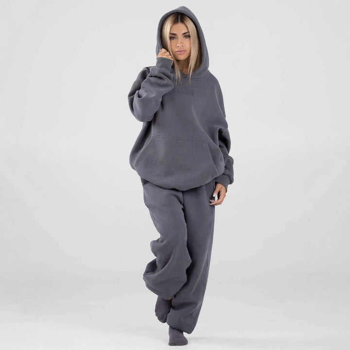 Women's casual sweatpants with high waistband, side pockets and elastic cuffs Mune Fashion