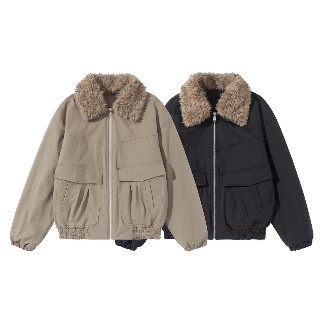 Women's short jacket with voluminous faux fur collar, kangaroo pockets, and elastic hem Mune Fashion