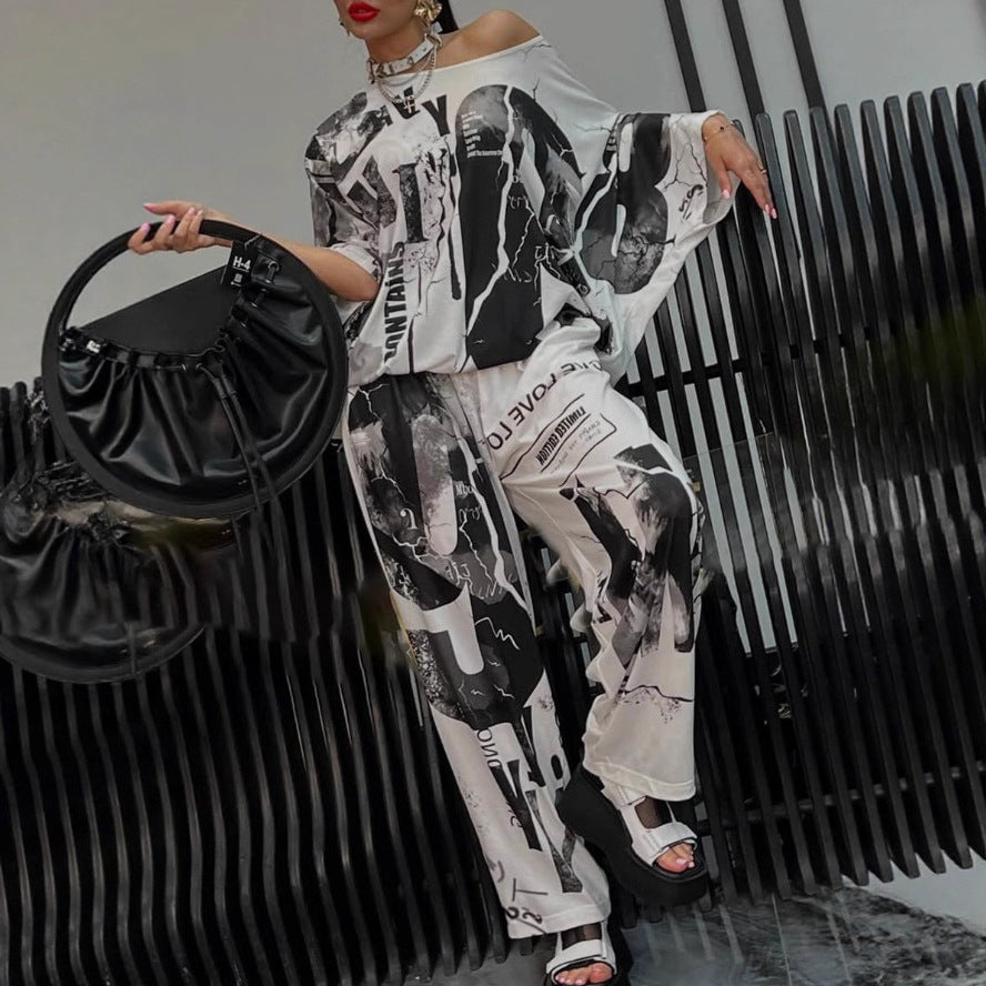 Ladies two-piece wide satin leisure set with off-shoulder batwing top and palazzo pants Mune Fashion