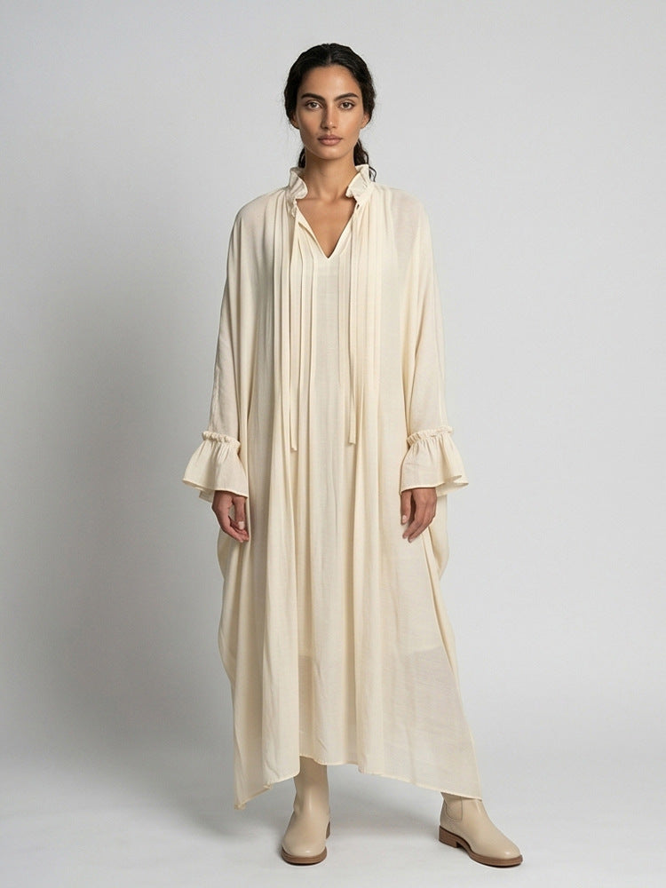 Women's maxi dress in kaftan style with ruffled collar, tie straps, and voluminous sleeves Mune Fashion