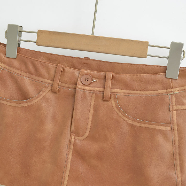 Ladies High-Waisted Faux Leather Mini Skirt with Decorative Seams and Belt Loops Mune Fashion