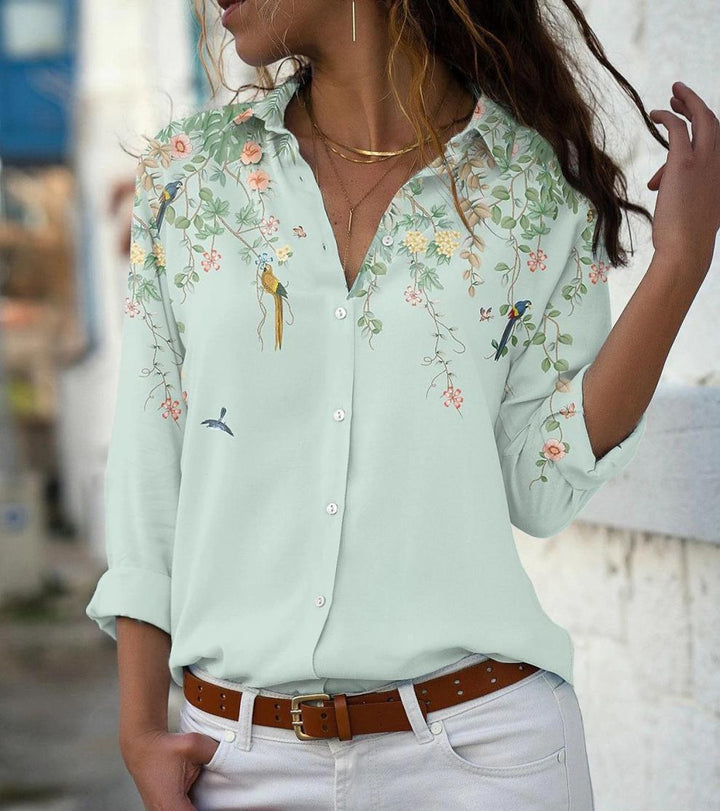 Women’s lightweight chiffon blouse with floral bird print, button placket and casual cut Mune Fashion