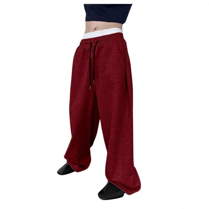 Women's wide oversize jogging pants with a deep crotch, elastic waistband, and drawstring Mune Fashion