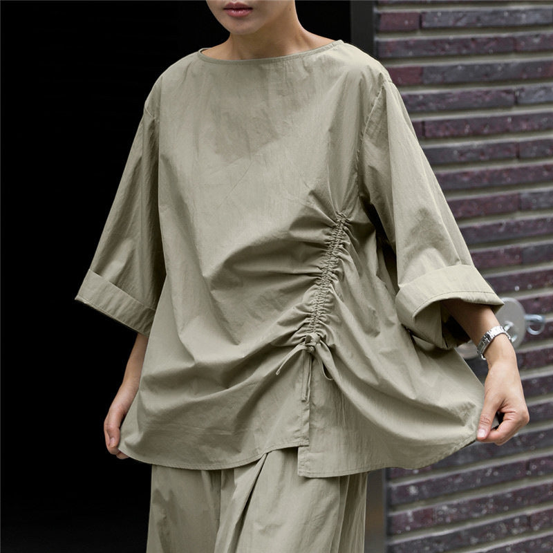 Women's oversized blouse with side cord gathering, bateau neckline, and wide sleeves Mune Fashion