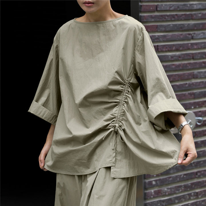Women's oversized blouse with side cord gathering, bateau neckline, and wide sleeves Mune Fashion
