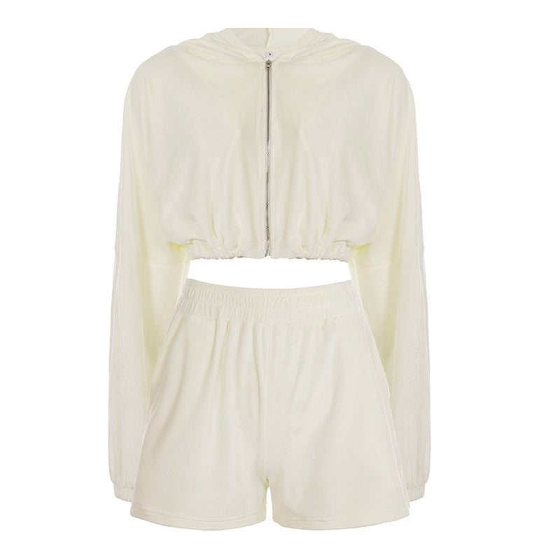 Women's cropped hoodie with drawstring at the waist, shiny satin look, front zipper and elastic cuffs Mune Fashion