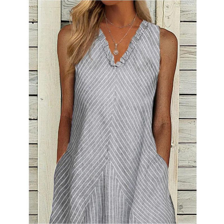 Women’s sleeveless A-line midi dress with ruffle V-neck, diagonal striped linen look and side pockets Mune Fashion