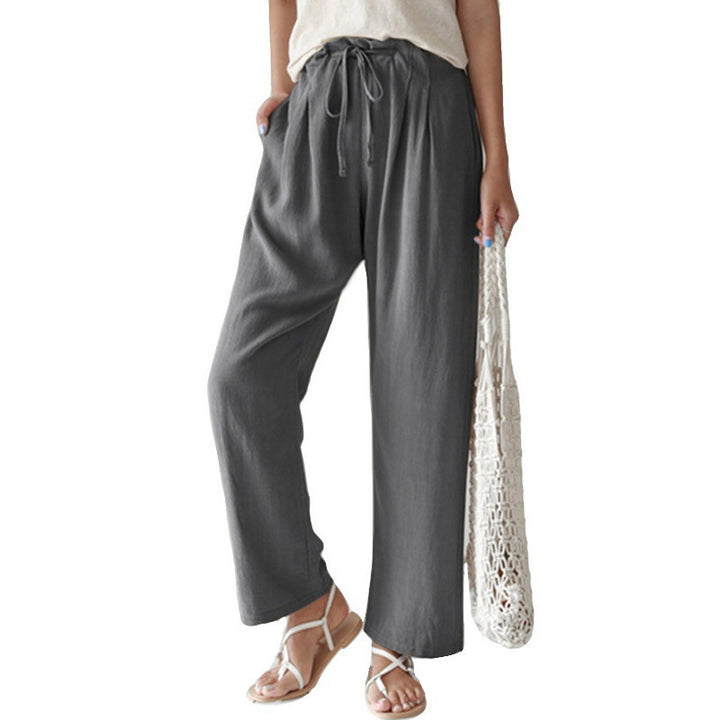 Ladies casual linen pants with wide legs, elastic waistband and side pockets Mune Fashion