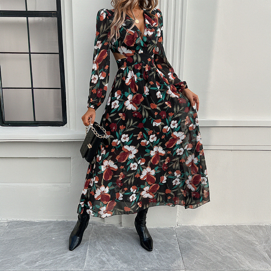 Ladies airy flowing chiffon maxi dress with waist cutouts, ruffled V-neckline and long, sheer sleeves Mune Fashion