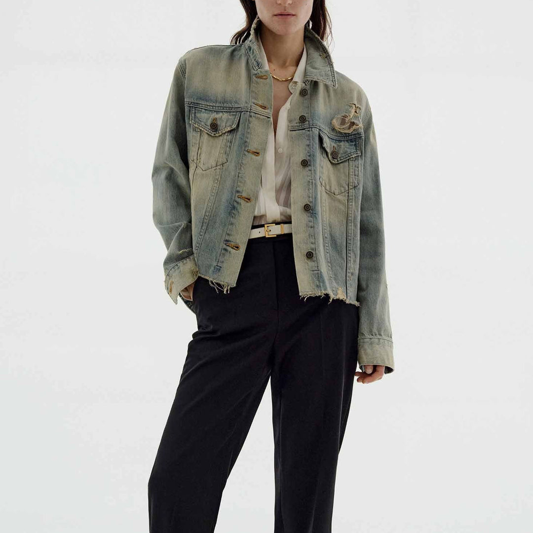 Women’s oversized destroyed denim jacket with raw hem, patch chest pockets, and vintage wash Mune Fashion