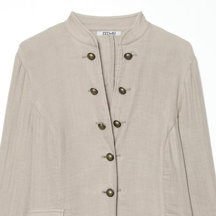 Women's short blazer with Mandarin collar, decorative button placket and curved hem Mune Fashion