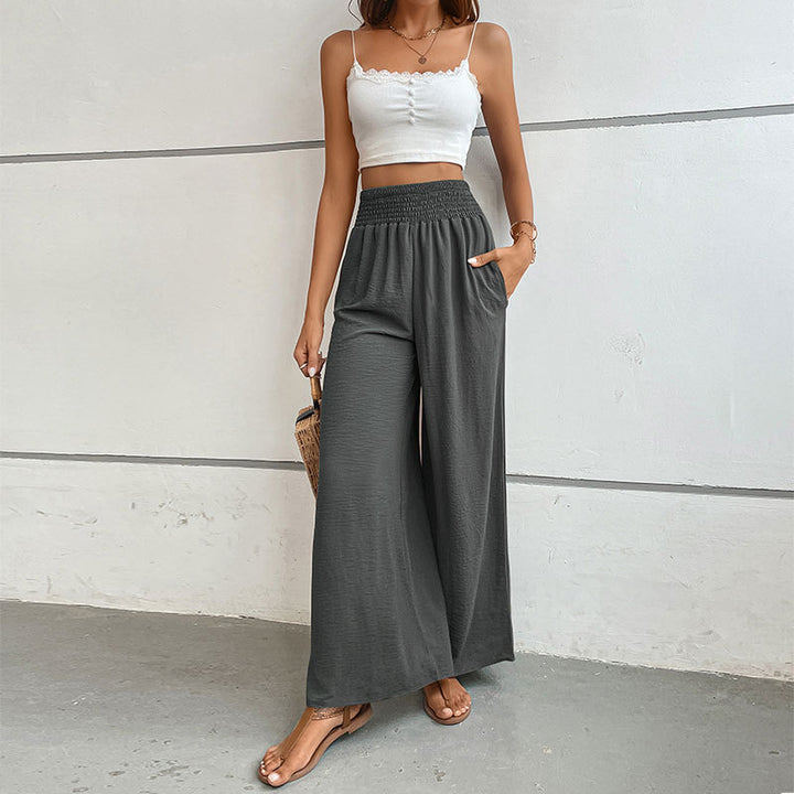 Women's palazzo pants with a high, elastic ruffled waistband and side pockets Mune Fashion