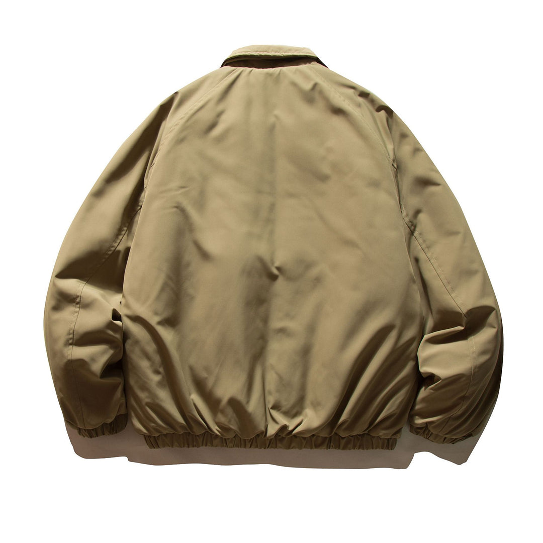 Men's short padded jacket with raglan sleeves, large flap pockets, and elastic hem Mune Fashion