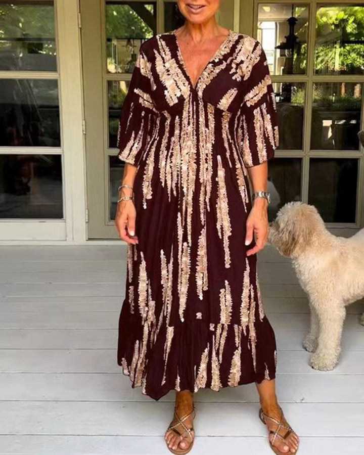 Women's maxi dress with V-neck, vertical brush print, gathered underbust seam and tiered ruffle skirt Mune Fashion