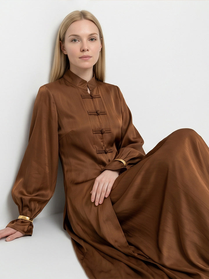 Women’s maxi dress with stand-up collar, traditional knot closure, and balloon sleeves Mune Fashion