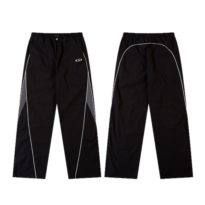 Men's sporty jogging pants with elastic waistband, side contrast piping, and straight cut Mune Fashion