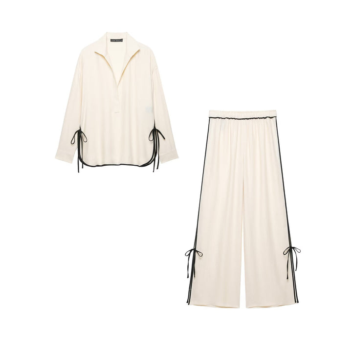 Women's oversized tunic with V-neck, lapel collar, and side ribbon details Drune
