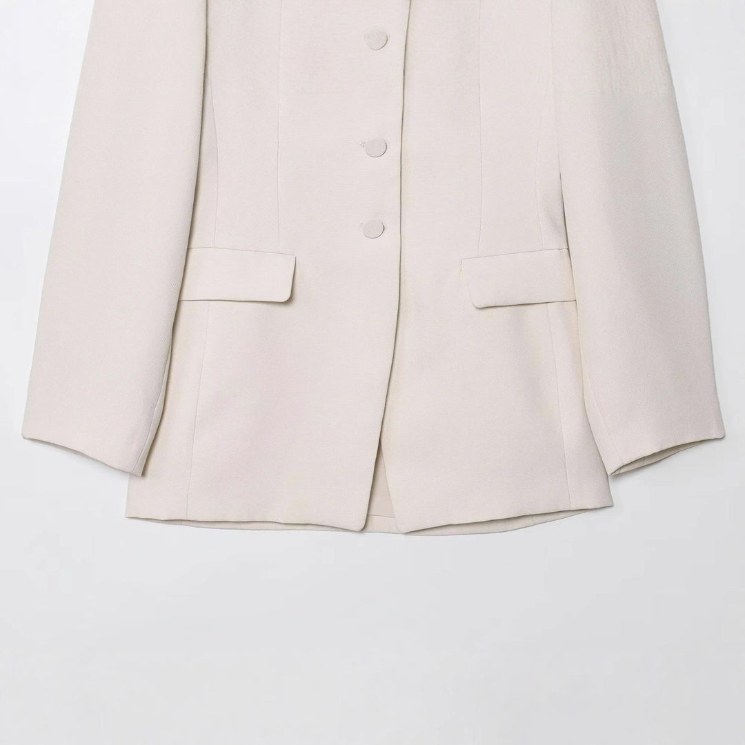Women tailored blazer jacket with round neckline, concealed button placket and flap pockets Mune Fashion