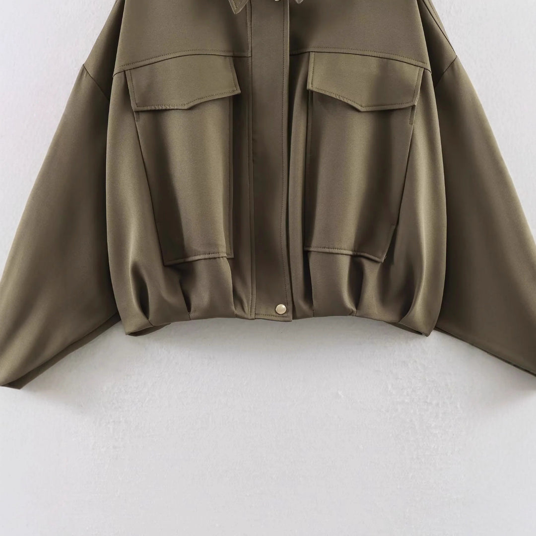 Women’s oversized utility jacket with oversized flap pockets, dropped shoulder, and elastic waistband Mune Fashion