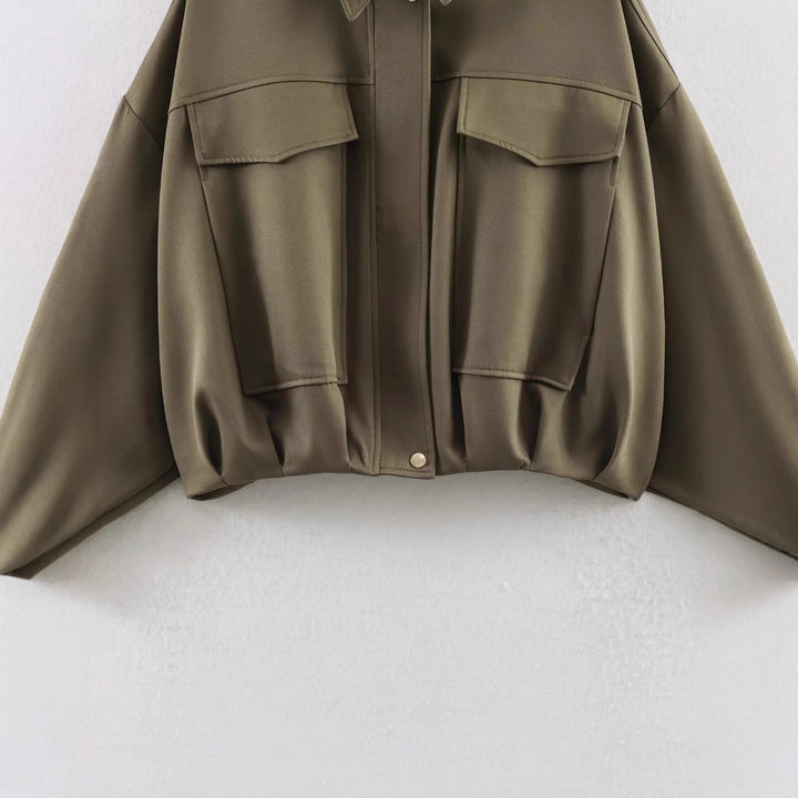 Women’s oversized utility jacket with oversized flap pockets, dropped shoulder, and elastic waistband Mune Fashion